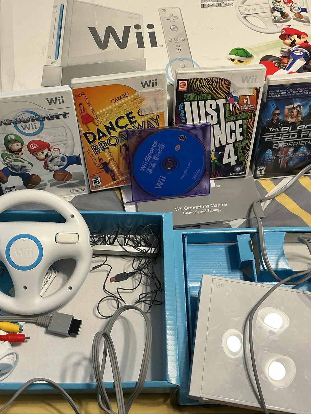 Nintendo Wii Console Bundle with White and Blue Accessories